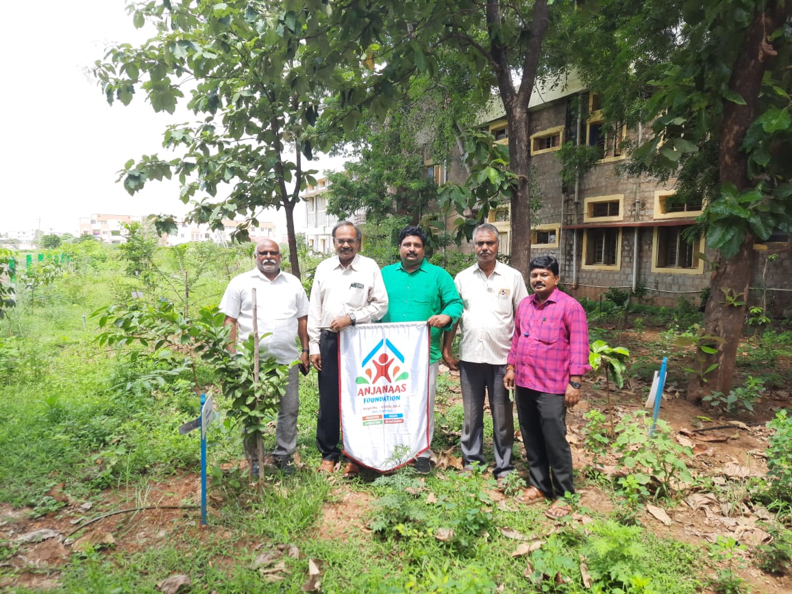 Anjanaas Foundation team and community members smiling for a group photo
